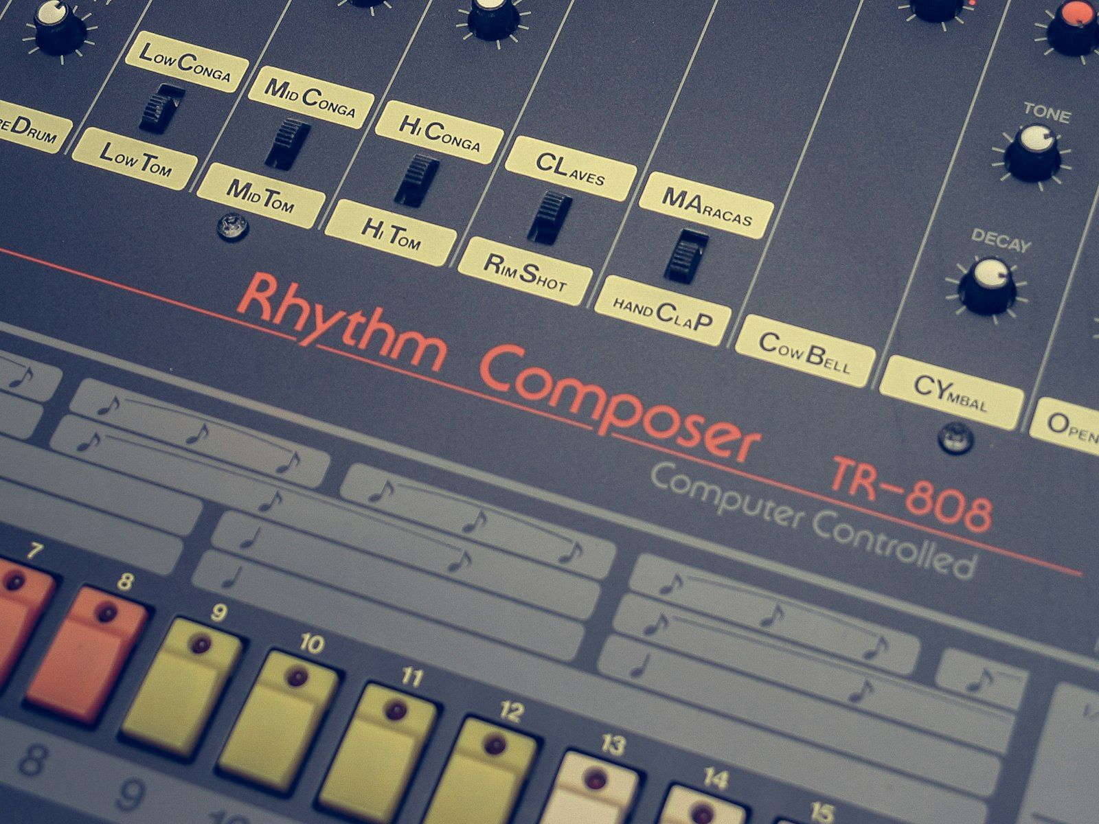 Close-up of a Roland TR-808 Rhythm Composer with its colored step buttons